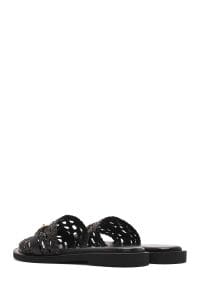 دمپایی زنانه چرمی مشکی بافت‌دار دری مد