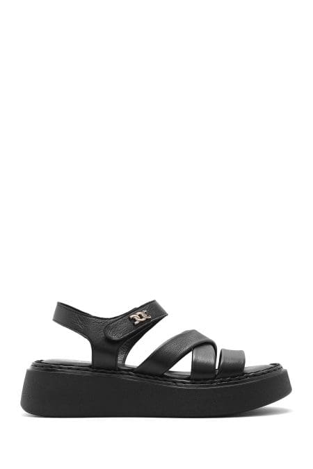 صندل زنانه مشکی چرم بنددار تخت ضخیم راحتی دری مد