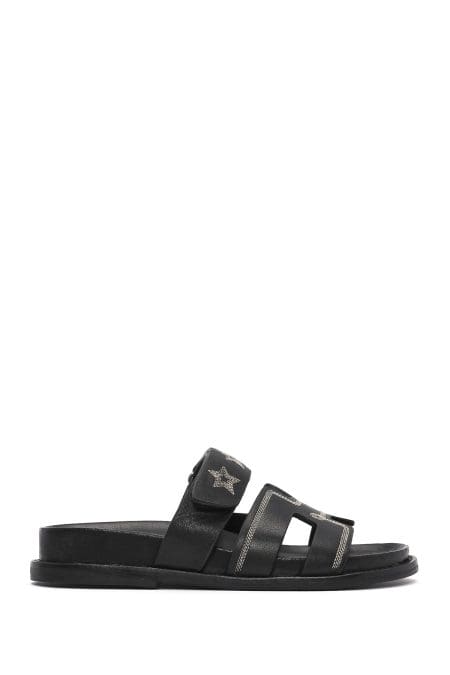 دمپایی زنانه چرمی مشکی بنددار طرح‌دار دری مد