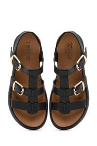 صندل زنانه مشکی چرم سگک‌دار تخت ضخیم دری مد