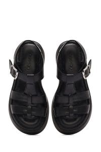 صندل زنانه مشکی چرم سگک‌دار تخت ضخیم راحتی دری مد