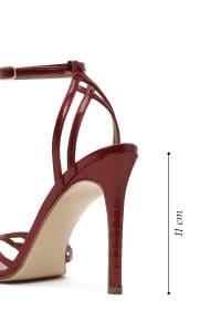 صندل زنانه چرمی قرمز ورنی با پاشنه بلند نازک و بنددار دری مد