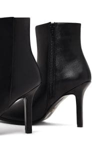 بوت زنانه چرم مشکی زیپ‌دار پاشنه‌بلند نازک دری مد