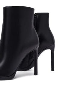 بوت زنانه چرم مشکی زیپ‌دار پاشنه‌بلند نازک دری مد