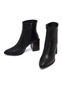 بوت زنانه چرم مشکی زیپ‌دار پاشنه‌ضخیم دری مد