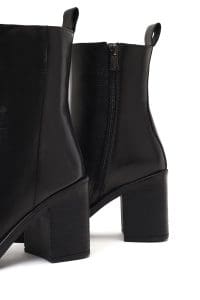 بوت زنانه چرم مشکی زیپ‌دار پاشنه‌ضخیم دری مد