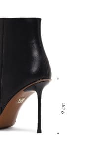 بوت زنانه چرم مشکی زیپ‌دار پاشنه‌نازک دری مد