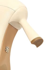 بوت زنانه چرم کرم زیپ‌دار پاشنه‌نازک دری مد