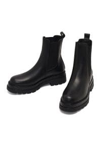 بوت چلسی زنانه چرم مشکی تخت‌ضخیم دری مد