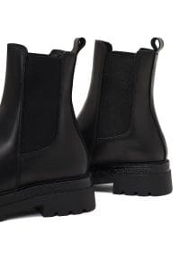 بوت چلسی زنانه چرم مشکی تخت‌ضخیم دری مد