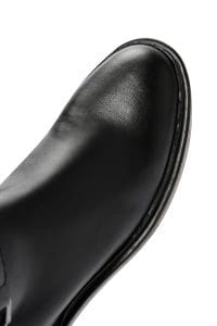 چکمه زنانه مشکی چرمی زیپ‌دار با تکه بند دری مد