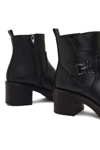 بوت زنانه مشکی زیپ‌دار پاشنه ضخیم دری مد