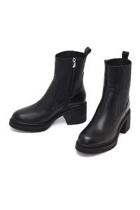 بوت چرمی زنانه مشکی زیپ‌دار پاشنه ضخیم دری‌مد