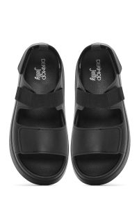 صندل زنانه مشکی ژله‌ای تخت ضخیم بندی دری مد