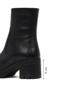 بوت چرمی زنانه مشکی زیپ‌دار پاشنه ضخیم دری مد