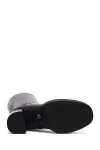 چکمه زنانه چرمی مشکی پاشنه‌بلند زیپ‌دار دری مد