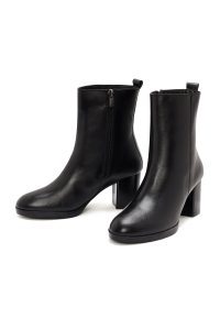 بوت زنانه چرم مشکی پاشنه‌بلند ضخیم زیپ‌دار دری مد