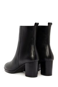 بوت زنانه چرم مشکی پاشنه‌بلند ضخیم زیپ‌دار دری مد