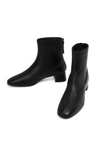 بوت زنانه چرم مشکی کوتاه زیپ‌دار پاشنه‌بلند ضخیم دری مد