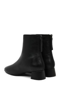 بوت زنانه چرم مشکی کوتاه زیپ‌دار پاشنه‌بلند ضخیم دری مد