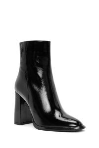 بوت زنانه چرم ورنی مشکی پاشنه‌بلند ضخیم بلند زیپ‌دار دری مد