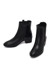 بوت چرمی زنانه مشکی زیپ‌دار پاشنه ضخیم دری مد