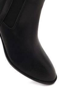 بوت چرمی زنانه مشکی زیپ‌دار پاشنه ضخیم دری مد