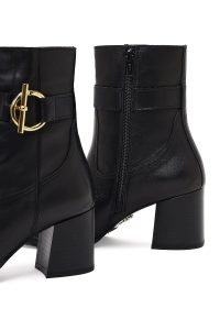 بوت چرمی زنانه مشکی زیپ‌دار پاشنه ضخیم دری مد