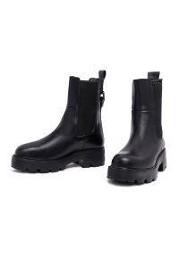 بوت چلسی زنانه چرمی مشکی زیره‌ضخیم دری مد