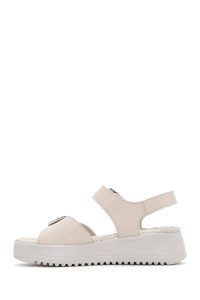 صندل راحتی زیره ضخیم کرمی زنانه با بند دار مچ پا