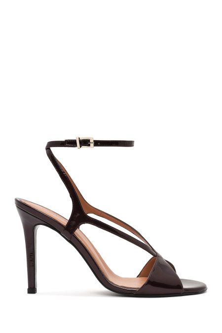 صندل زنانه زرشکی چرم پاشنه‌نازک بلند بنددار دری مد