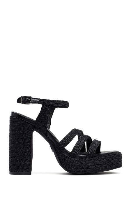 صندل زنانه مشکی مچی سگک‌دار پاشنه‌بلند ضخیم بستر حصیری دری مد