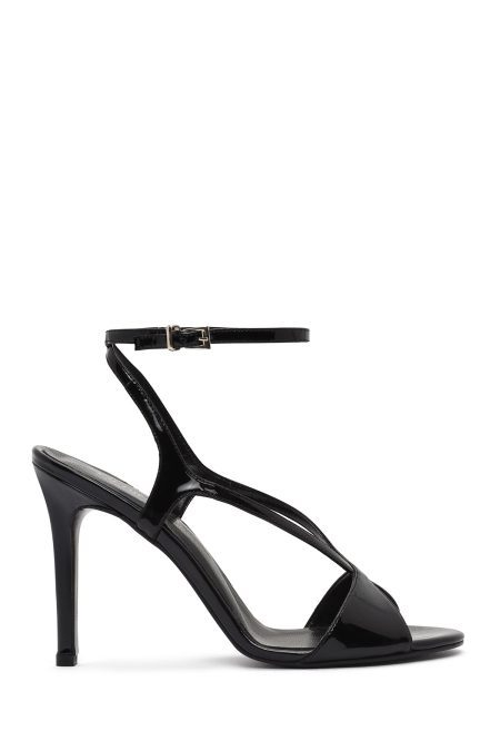 صندل زنانه مشکی چرم بنددار پاشنه‌نازک بلند دری مد