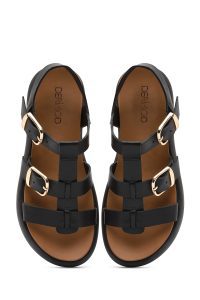 صندل زنانه مشکی چرم سگک‌دار تخت ضخیم دری مد