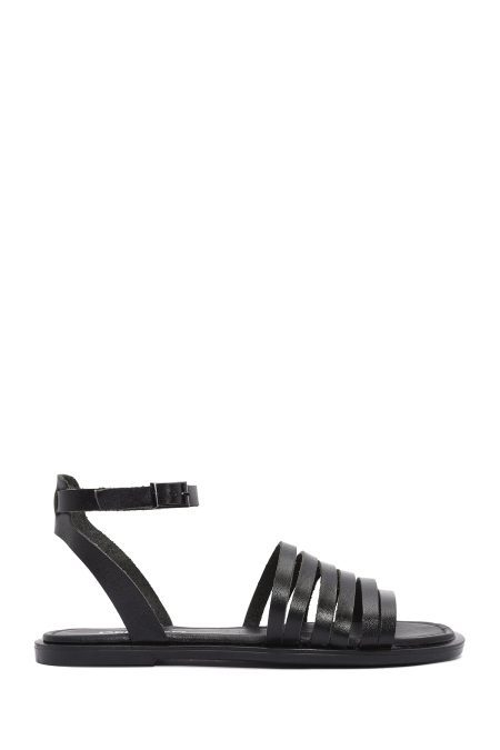 صندل زنانه چرمی مشکی بندی مدل بدروم دری مد