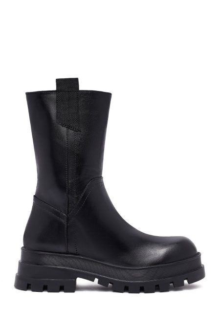 نیم بوت زنانه چرمی مشکی زیپ‌دار زیره‌ضخیم دری مد