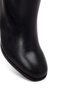 چکمه زنانه چرم مشکی پاشنه‌بلند ضخیم دری مد