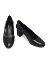 کفش زنانه چرم مشکی پاشنه‌بلند ضخیم دری مد