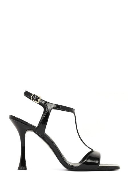 صندل زنانه چرم ورنی مشکی بنددار مچ پا پاشنه‌بلند دری مد