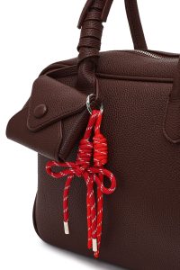 کیف زنانه زرشکی بلند بنددار دری مد