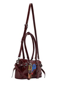 کیف زنانه زرشکی بنددار با اکسسوری دری مد