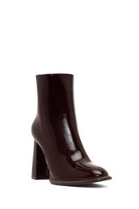 بوت زنانه زرشکی چرمی براق زیپ‌دار پاشنه ضخیم دری مد